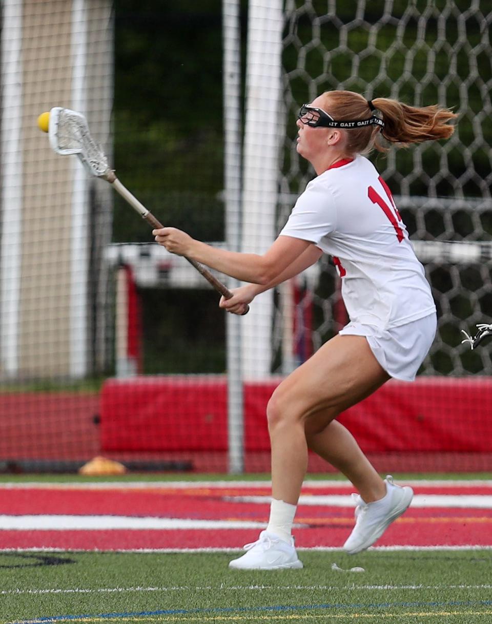 Somers' Teagan Ryan (14) fires a shot for a first half goal against Hen Hud, during girls lacrosse action at Somers High School May 11, 2023. Somers won the game 12-7.