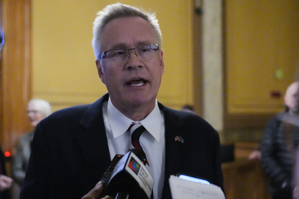 Plaintiff John Rust speaks with reporters following oral arguments before the Indiana Supreme Court at the Statehouse in Indianapolis, Monday, Feb. 12, 2024. GOP Senate candidate, John Rust, who is suing to appear on the primary ballot. A trial judge ruled in December that a state law that stipulates candidates must vote in two primary elections with their party is unconstitutional. The state appealed the ruling. (AP Photo/Michael Conroy)