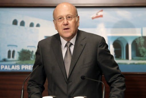 Lebanese premier Najib Mikati, seen here on June 1, has said his Hezbollah-dominated government will deal "responsibly and realistically" with a UN indictment issued in the 2005 murder of ex-premier Rafiq Hariri