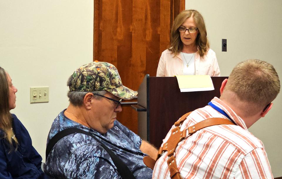 North East Township resident Carol Strine speaks in opposition to CleanChoice Energy's plan to build a 25-acre solar farm at the corner of Crawford Road and Route 89 on Monday, Aug. 7, 2023, during a public hearing at the North East Township Administration Building. Strine lives on Crawford Road.