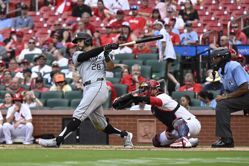 Chicago White Sox's Tommy Pham hits an RBI single during the 10th inning of a baseball game against the St. Louis Cardinals Saturday, May 4, 2024, in St. Louis. (AP Photo/Jeff Le)