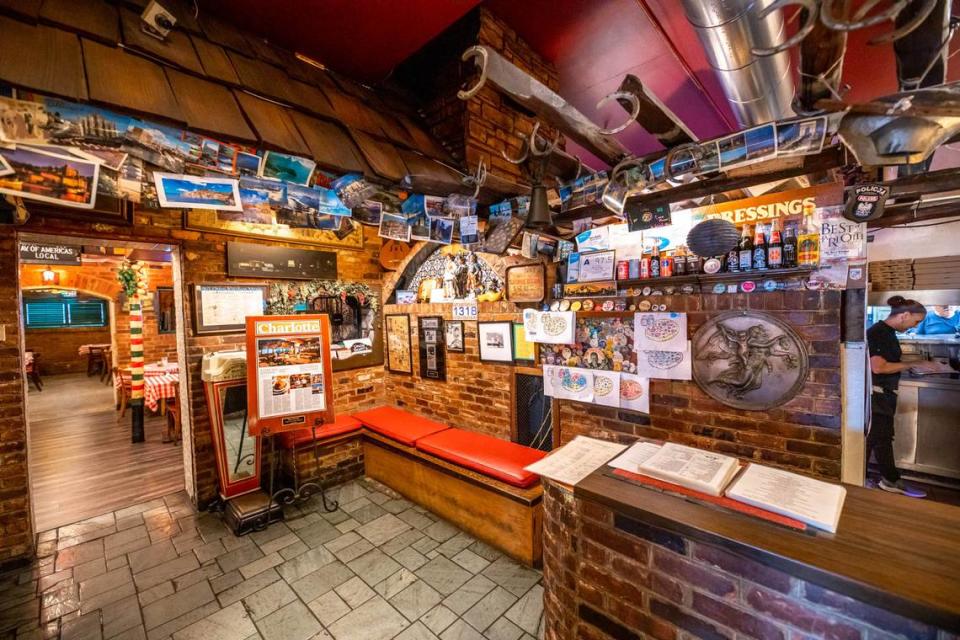 The entrance and dining room walls inside Open Kitchen are decorated with memorabilia from family and guests who have frequented over the years.