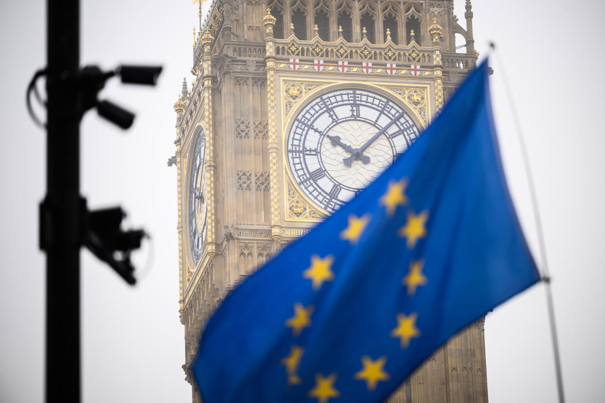 LONDON, ENGLAND - JANUARY 25: An EU flag is seen flying in front of Elizabeth Tower, commonly referred to as Big Ben, as protestors campaign against the ongoing impacts of Brexit on January 25, 2023 in London, England. (Photo by Leon Neal/Getty Images)