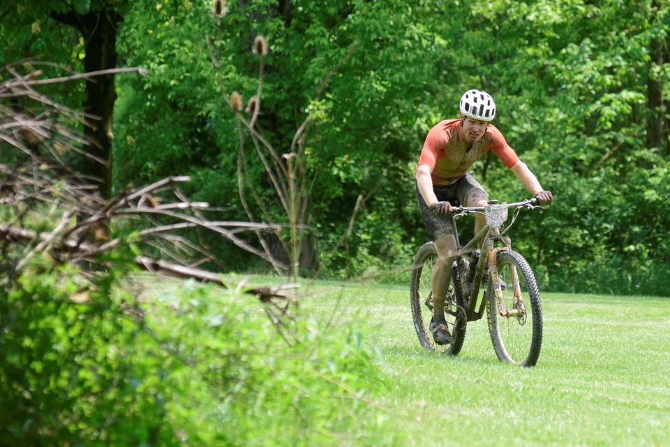 A rider competes in the 2023 Mohican Mountain Bike Race in Loudonville.