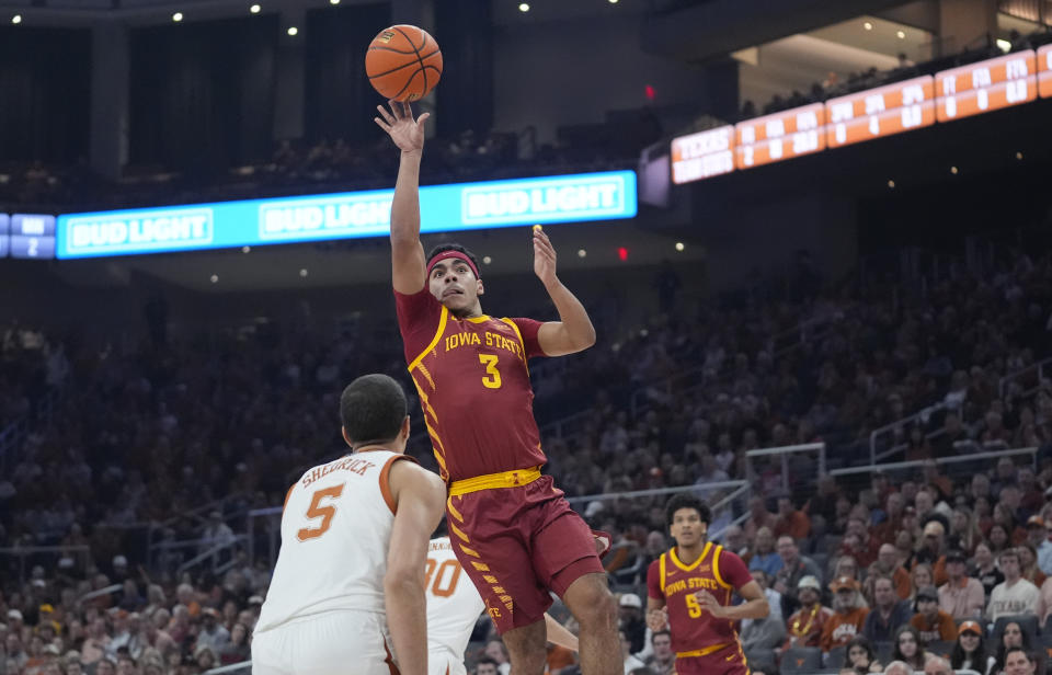 Iowa State guard Tamin Lipsey (3) shoots over Texas forward Kadin Shedrick (5) during the first half of an NCAA college basketball game Tuesday, Feb. 6, 2024, in Austin, Texas. (AP Photo/Eric Gay)