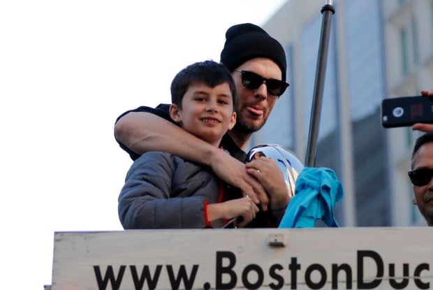 Tom Brady poses with son Benjamin during the New England Patriots Super Bowl Victory Parade on Feb. 5. 2019, through the streets of Boston.<p><a href="https://www.gettyimages.com/detail/1094523672" rel="nofollow noopener" target="_blank" data-ylk="slk:Icon Sportswire/Getty Images;elm:context_link;itc:0;sec:content-canvas" class="link ">Icon Sportswire/Getty Images</a></p>