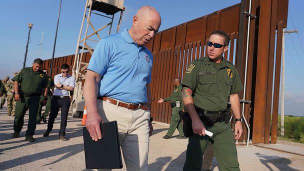 PHOTO: In this May 17, 2022, file photo, Homeland Security Secretary Alejandro Mayorkas listens to Deputy patrol agent in charge of the US Border Patrol Anthony Crane as he tours the section of the border wall, in Hidalgo, Texas. (Joel Martinez/The Monitor via AP, Pool/FILE)