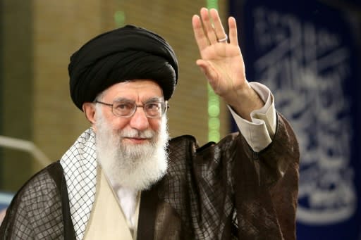 A handout picture provided by the office of Iran's supreme leader on April 30, 2018, shows Ayatollah Ali Khamenei waving to a crowd on Labour Day