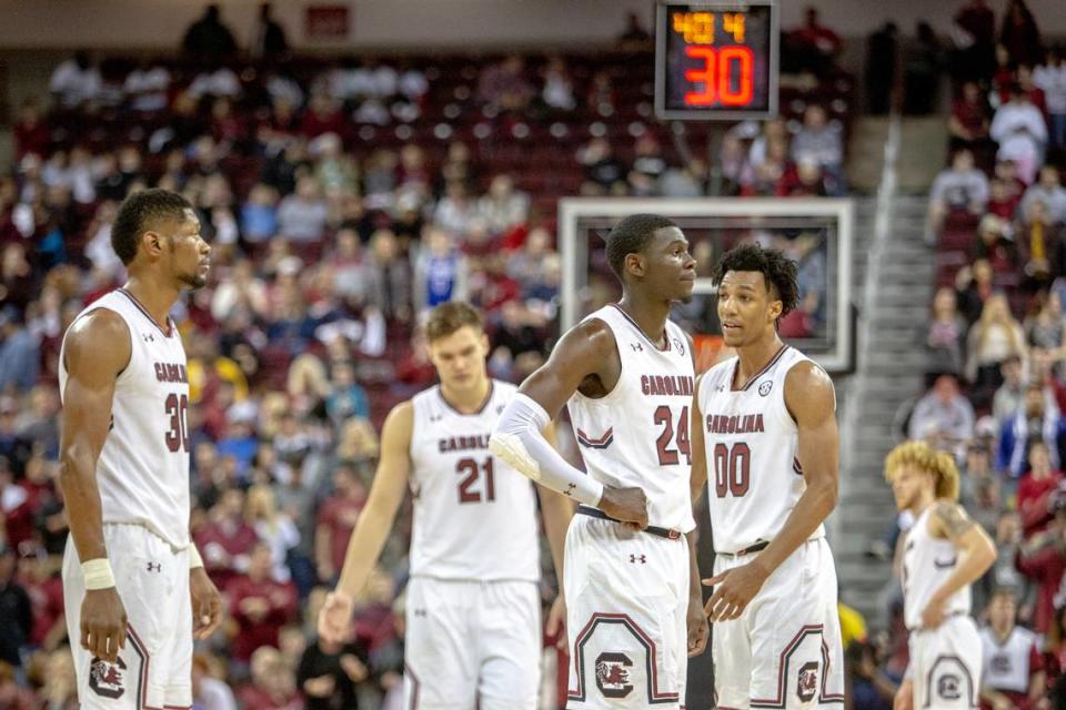 South Carolina Gamecocks forward Chris Silva (30), South Carolina Gamecocks forward Keyshawn Bryant (24) and South Carolina Gamecocks guard A.J. Lawson (00) take the court during the game against Arkansas at Colonial Life Arena on Saturday Feb. 9, 2019, in Columbia, SC.