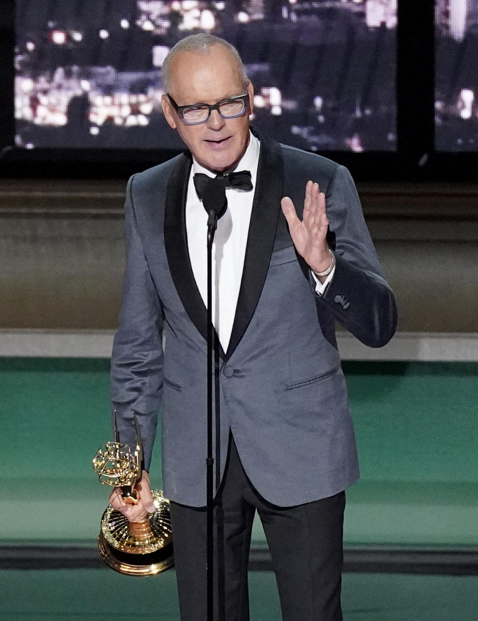 Michael Keaton accepts the Emmy for outstanding lead actor in a limited or anthology series or movie for "Dopesick" at the 74th Primetime Emmy Awards on Monday, Sept. 12, 2022, at the Microsoft Theater in Los Angeles. (AP Photo/Mark Terrill)