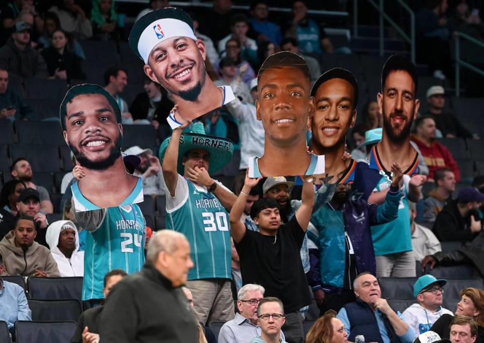 Charlotte Hornets fans cheer on the team during second half action against the Indiana Pacers at Spectrum Center in Charlotte, NC on Monday, February 12, 2024. The Hornets defeated the Pacers 111-102.