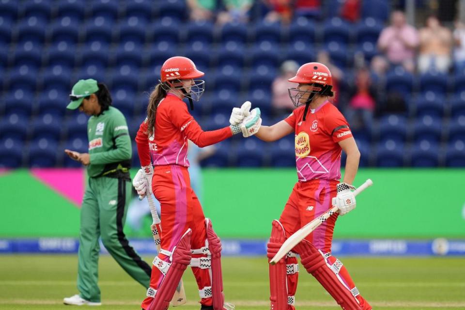 JOY: Welsh Fire’s Sarah Bryce (left) and Jess Jonassen celebrate victory in the Hundred <i>(Image: Nick Potts)</i>