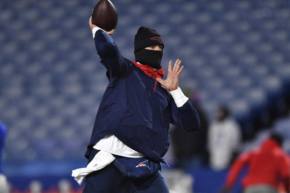 New England Patriots quarterback Mac Jones warms up before Monday night's game at Buffalo. (AP Photo/Adrian Kraus)