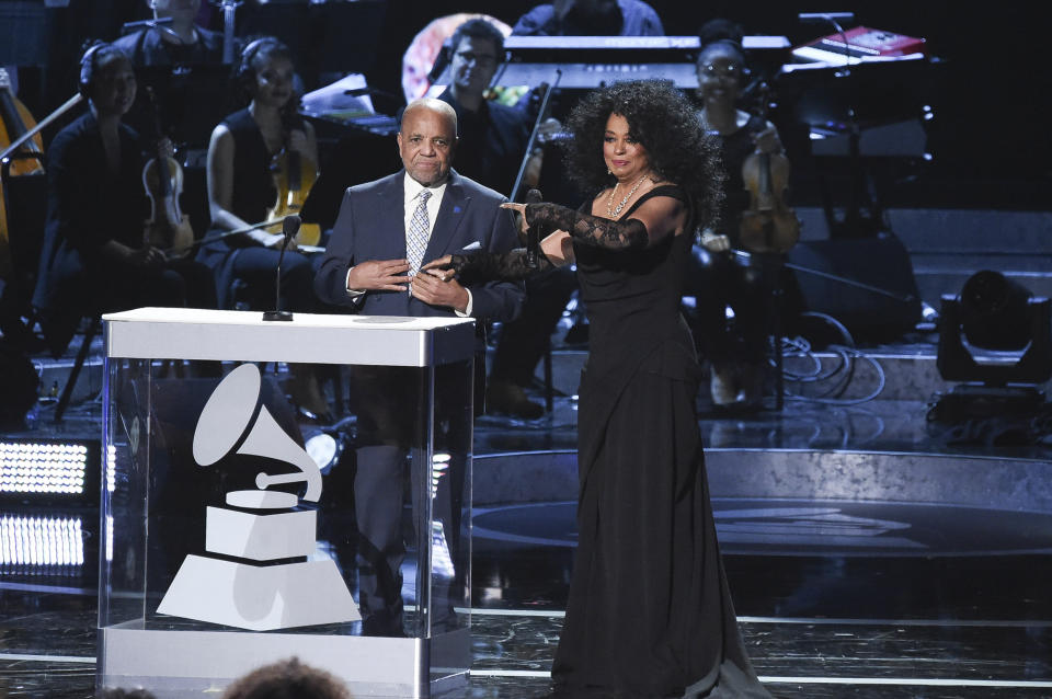 FILE - In this Tuesday, Feb.12, 2019 file photo, Berry Gordy, left, and Diana Ross speak onstage during Motown 60: A GRAMMY Celebration at the Microsoft Theater in Los Angeles. Gordy says his historic label brought people from all walks of life through a "legacy of love" at the "Motown 60: A Grammy Celebration" during a taped tribute that will air April 21 on CBS. (Photo by Richard Shotwell/Invision/AP, File)