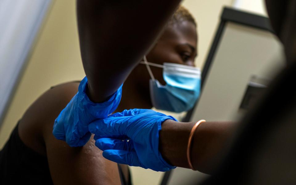 A man receiving the vaccine in Johannesburg