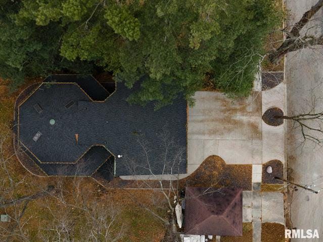 An aerial view of the "goth" home in Lincoln, Illinois shows it's unusual shape with octagonal front.