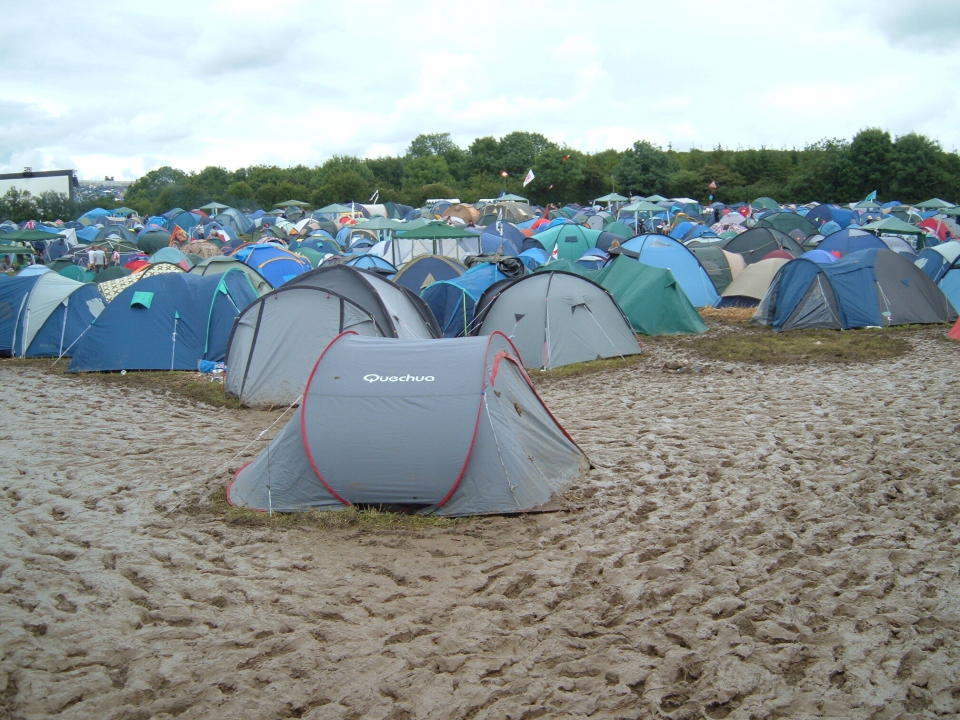 Sea of mud: The grass around tents in 2007 became almost completely liquid mud due to heavy rain. (Tom Butler/Yahoo UK)