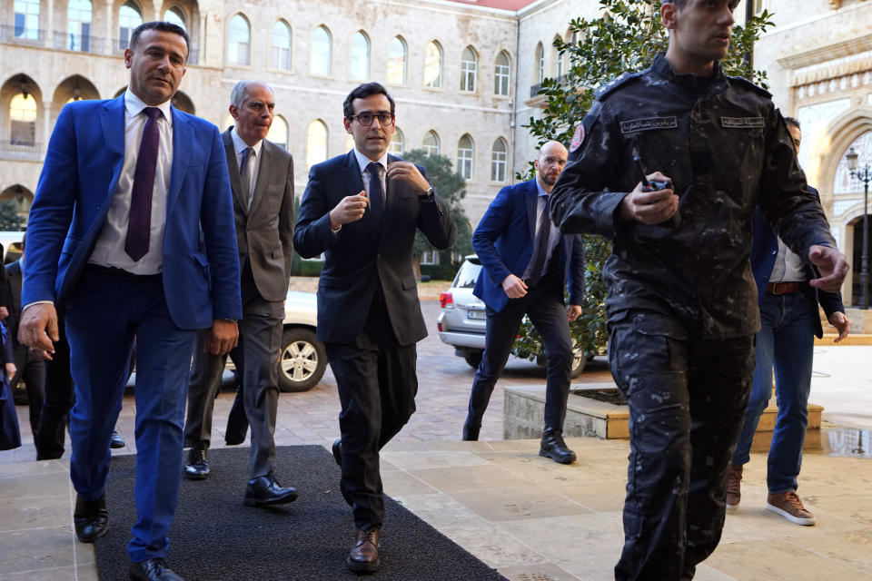 French Foreign Minister Stephane Sejourne, center, arrives to meet Lebanese caretaker Prime Minister Najib Mikati in Beirut, Lebanon, Tuesday, Feb. 6, 2024. Sejourne arrived in Beirut earlier in the day on an official visit to discuss the situation in the Middle East and tensions along the Lebanon-Israel border. (AP Photo/Bilal Hussein)