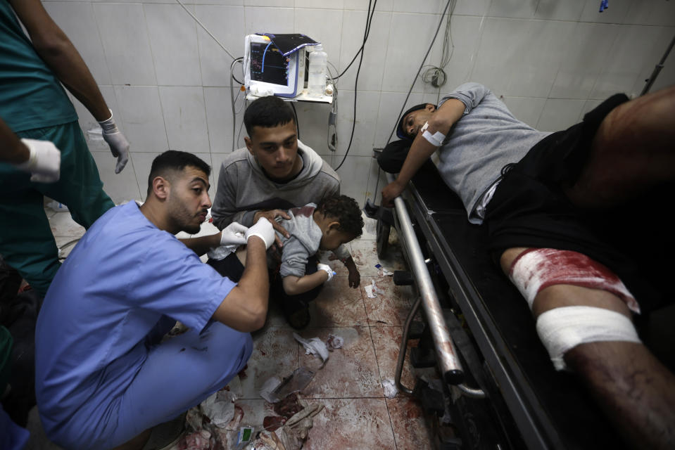 Palestinians wounded in the Israeli bombardment of the Gaza Strip receive treatment at the Nasser hospital in Khan Younis, Southern Gaza Strip, Monday, Jan. 22, 2024. (AP Photo/Mohammed Dahman)