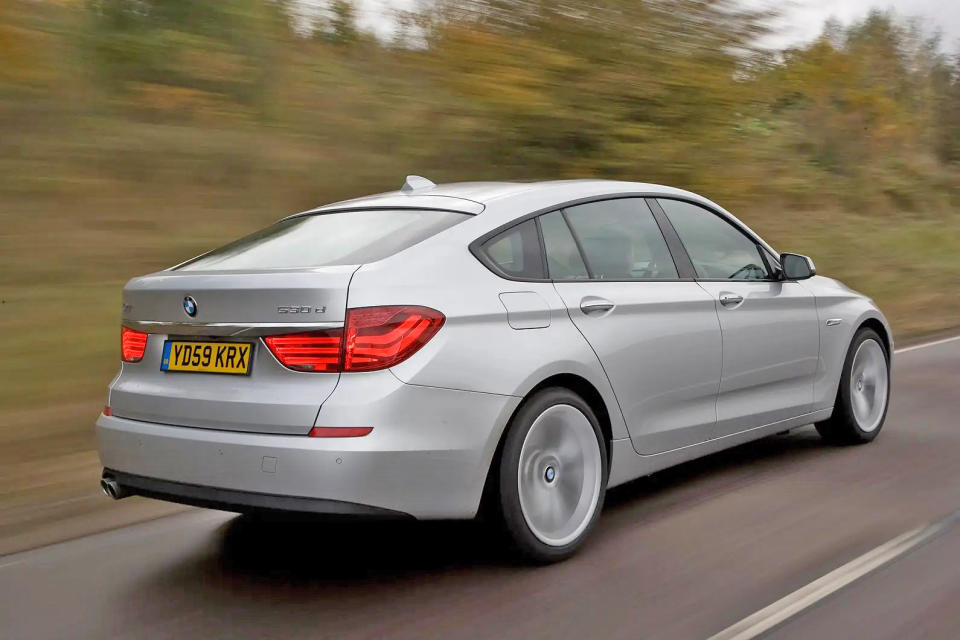 <p>BMW attempted to slot the 5 Series GT between the regular 5 Series and 5 Series Touring and while the front was still aggressive, the hatchback rear was classed by many as ungainly. The GT sat on the 7 Series platform making it longer than a Land Rover Discovery of the same era and 300kg heavier than a standard 5 Series. </p><p>Regardless, its winning point for us is the lush interior with aluminium switchgear and <strong>lashings of quality wood</strong>, especially when equipped with white leather seats and executive-style two single rear seats.</p>