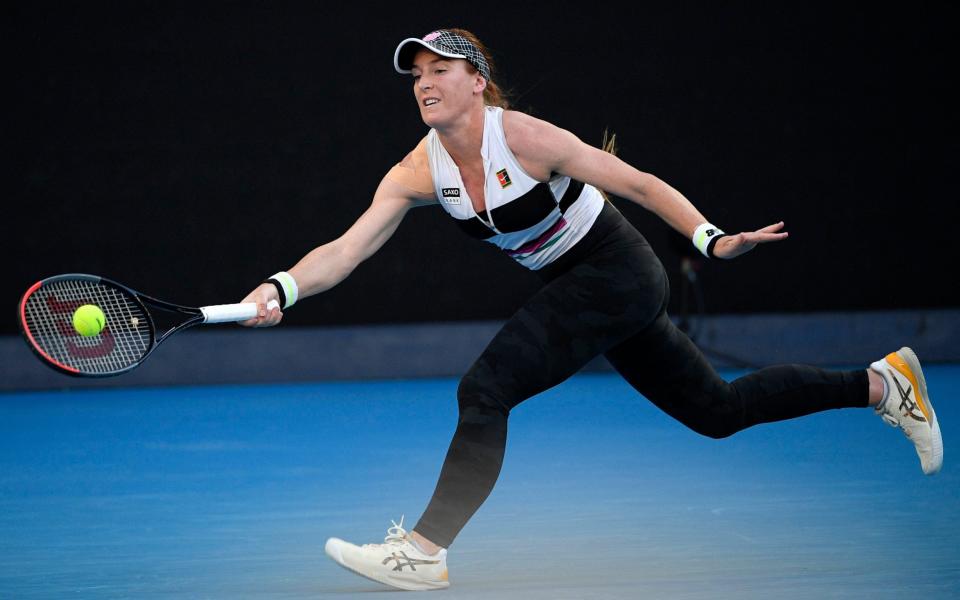 Madison Brengle of the U.S. plays a forehand return to Naomi Osaka of Japan during their second round match at the Australian Open tennis championships in Melbourne - AP Photo/Andy Brownbill