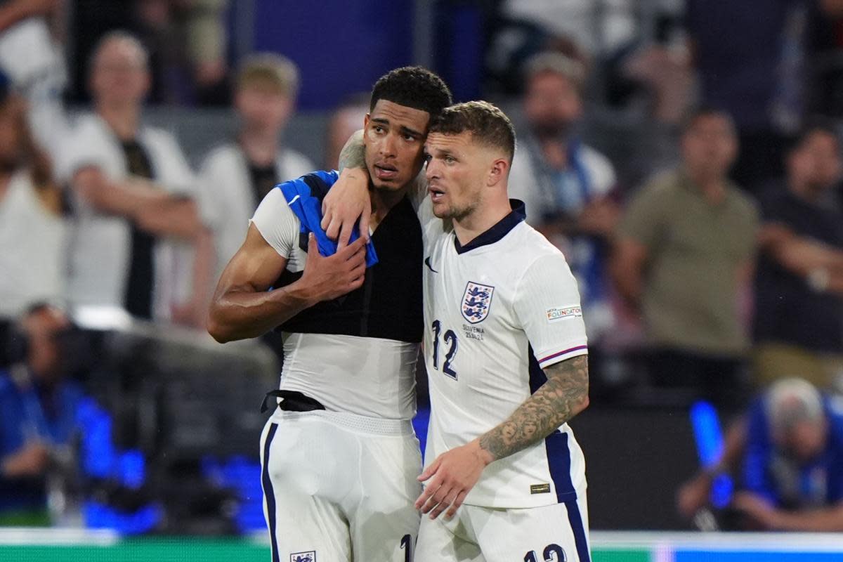 England's Jude Bellingham and Kieran Trippier following the UEFA Euro 2024 Group C match at the Cologne Stadium in Germany. Pic:  Bradley Collyer/PA Wire