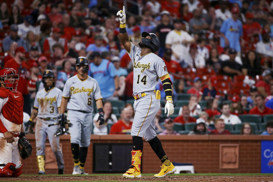 Pittsburgh Pirates' Rodolfo Castro gestures skyward as he crosses home plate after hitting a solo home run against the St. Louis Cardinals during the eighth inning of a baseball game Thursday, April 13, 2023, in St. Louis. (AP Photo/Scott Kane)