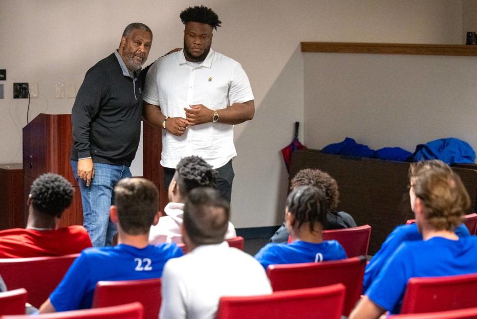 Kevin Willmott, an Academy Award winning film director and screenwriter, addresses the KU Men’s basketball team about the importance of Juneteenth and uses Chris Hughes, assistant director of inclusive access, as an illustration on slavery. “Chris is obviously big guy, big young, strong guy,” said Willmott. “In 1860, if Chris was a slave, he would be worth as much as a Lexus is today. He would be worth about $25,000, $30,000 in the context of the economy in 1860,” said Willmott, a professor at KU who teaches in the Film & Media studies program. He won an Academy Award in 2019 for Best Adapted Screenplay for “BlacKkKlansman.”