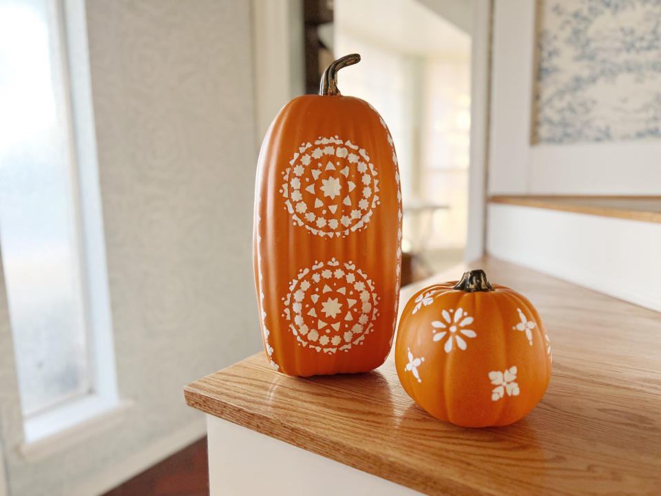 small and large stenciled pumpkins