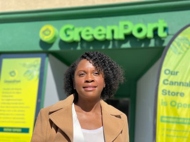 Vivianne Wilson, founder and president GreenPort Cannabis, in front of her College Street store.  (Philip Lee-shanok/CBC - image credit)