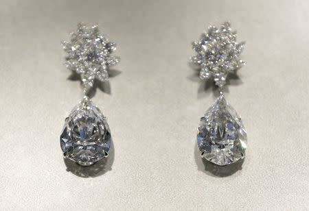 Miroir de l'Amour, a pair of flawless diamond pear-shaped earrings are displayed during a sale preview at Christie's auction house in London, Britain October 20, 2016. REUTERS/Neil Hall