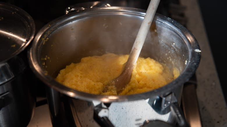 pot of polenta with spoon 