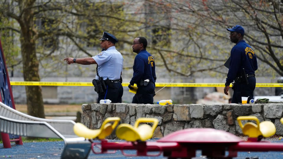 Investigators seen at the scene of the shooting on April 10, 2024. - Matt Rourke/AP