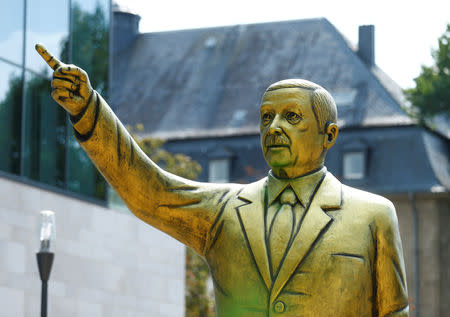 A statue of Turkish President Tayyip Erdogan is seen during the art exhibition "Wiesbaden Biennale" in Wiesbaden, Germany, August 28, 2018. REUTERS/Ralph Orlowski