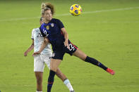 United States midfielder Kristie Mewis (22) and Argentina midfielder Daiana Falfan (20) compete for a header during the first half of a SheBelieves Cup women's soccer match, Wednesday, Feb. 24, 2021, in Orlando, Fla. (AP Photo/Phelan M. Ebenhack)