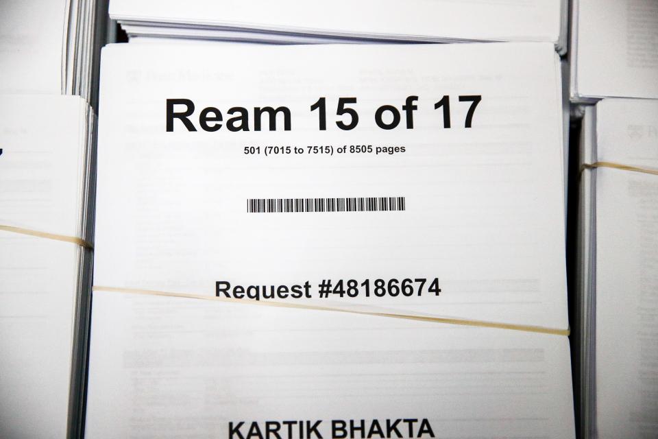 Mukesh Bhakta received seven CDs full of radiograph images and 8,505 pages of medical records from Kartik's hospital stay after he received his first dose of the Pfizer COVID-19 vaccine on April 19, 2021, at the Philadelphia Convention Center. On Oct. 19, 2021, Mukesh displayed the records on the family's coffee table in Kingsville, Texas.