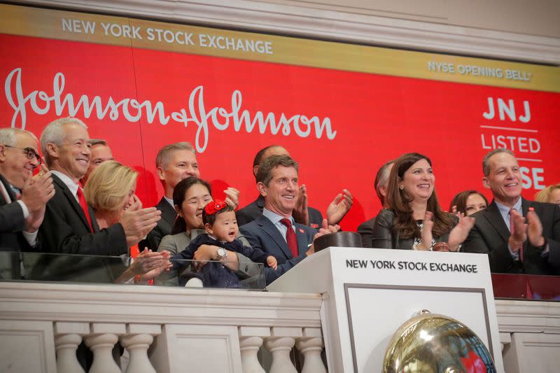 FILE PHOTO: Alex Gorsky, Chairman and CEO of Johnson & Johnson, rings the opening bell to celebrate the 75th anniversary of his company's listing at the NYSE in New York