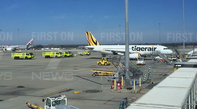 Fire trucks with a Tigerair flight which landed in Melbourne. Picture: 7 News