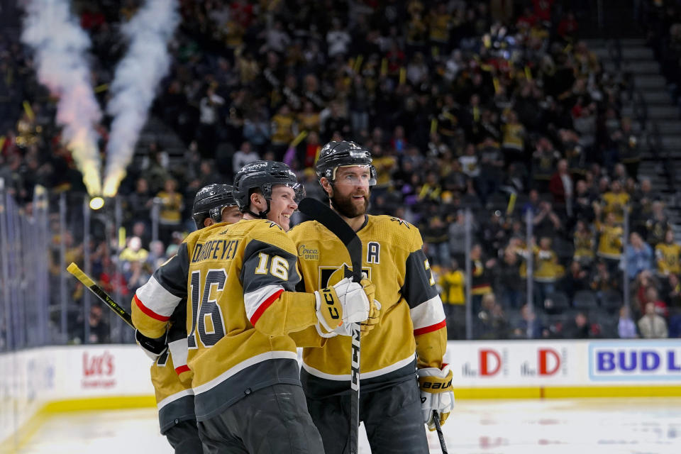 Vegas Golden Knights celebrate a goal against the Los Angeles Kings during the second period of an NHL hockey game Thursday, April 6, 2023, in Las Vegas. (AP Photo/Lucas Peltier)