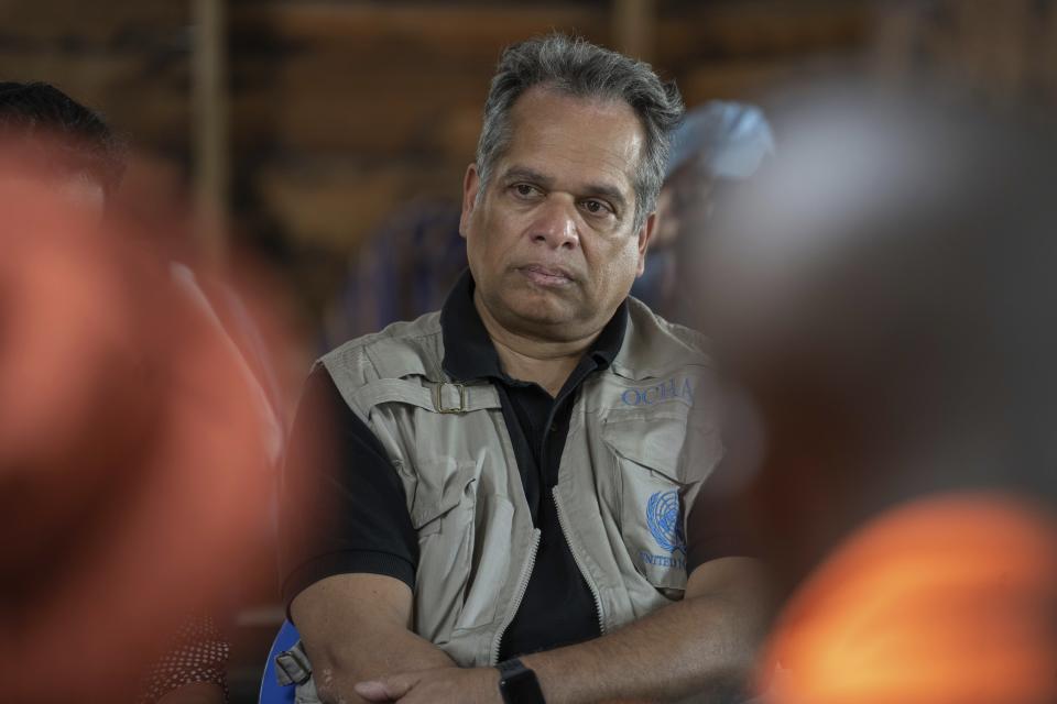 OCHA (United Nations Office for the Coordination of Humanitarian Affairs) head and representative Ramesh Rajasingham meets people displaced by the ongoing fighting between Congolese forces and M23 rebels in a camp on the outskirts of Goma, Democratic Republic of Congo, Wednesday, March 13, 2024. Rajasingham is on a working visit to the region. (AP Photo/Moses Sawasawa)