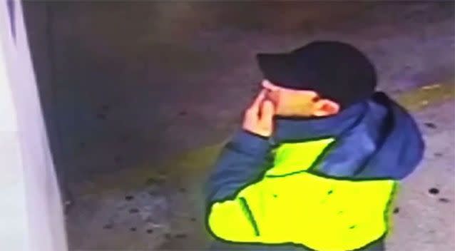 The man police want to talk to was wearing a fluorescent jacket and a black cap. Photo: NSW Police