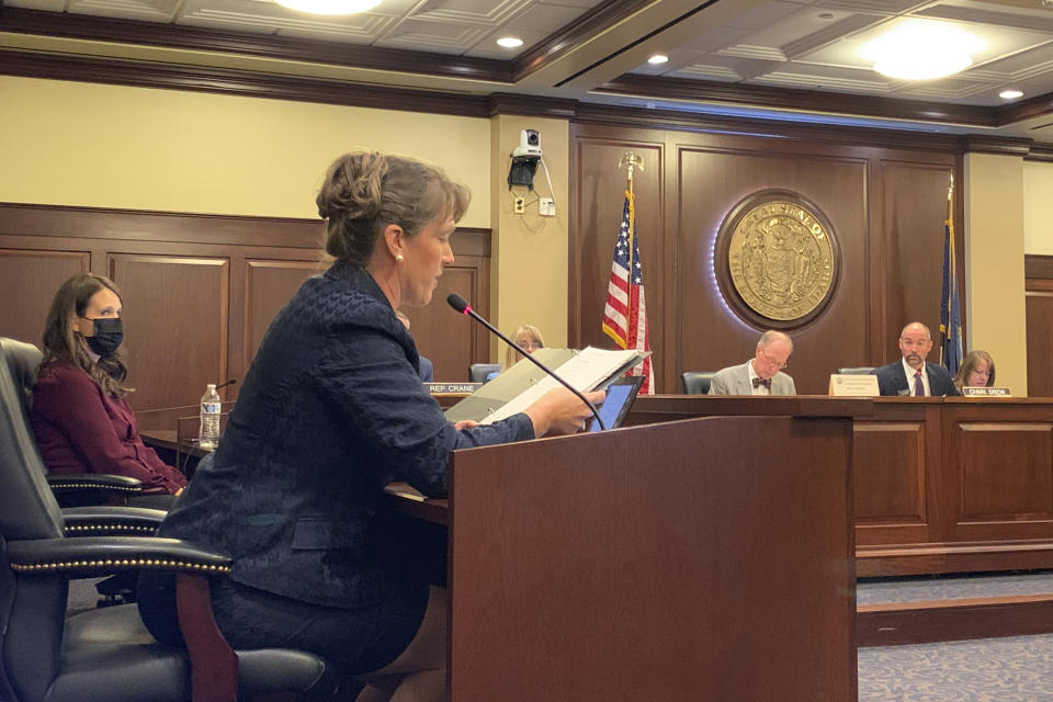 Rep. Priscilla Giddings responds to questions from ethics committee attorney Christopher McCurdy during a hearing to determine if she violated the Idaho Legislature's ethics rules by publicizing the name of a young intern who accused one of Giddings' fellow lawmakers of rape in Boise, Idaho., on Monday, Aug. 2, 2021. An Idaho lawmaker accused of violating ethics rules by publicizing the name of an alleged rape victim in disparaging social media posts and then allegedly misleading lawmakers about her actions, said in an ethics hearing Monday that she did nothing wrong and claimed the allegations against her were politically motivated. (AP Photo/Rebecca Boone)