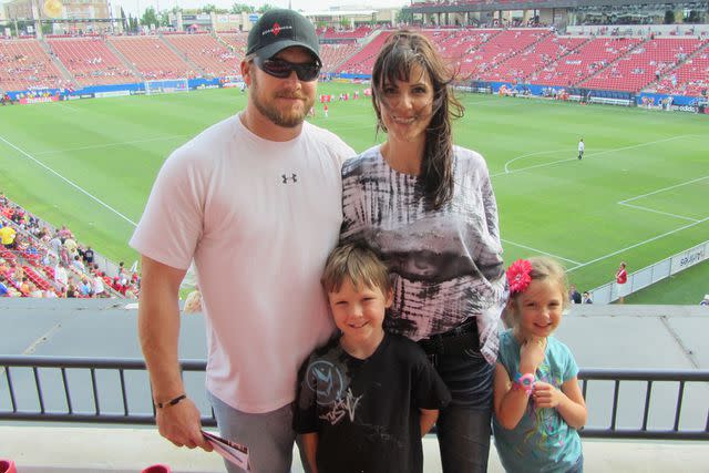 <p>Courtesy of Taya Kyle</p> Chris, Taya, Colton and McKenna Kyle at a soccer match in Dallas.