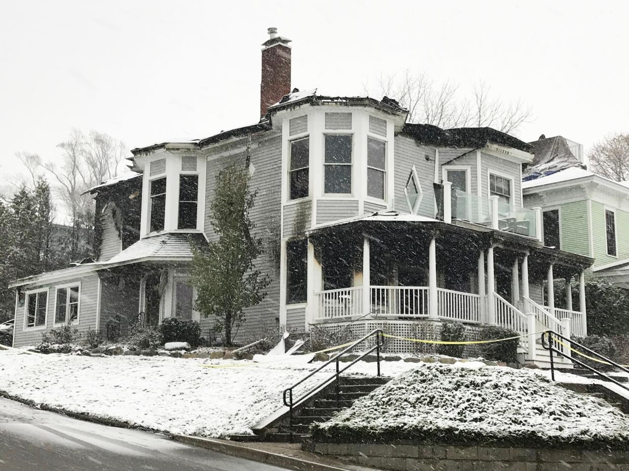 The fire-damaged home at 500 Rose St. is seen on Tuesday, Nov. 15.