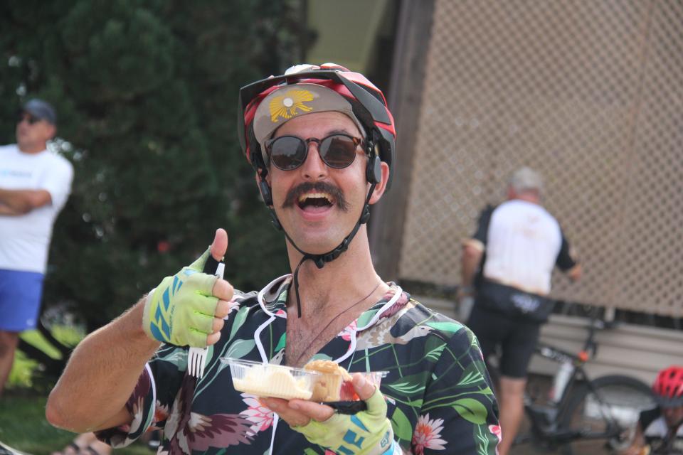 Chad Tomlinson of Los Angeles approves of his piece of pie from the Rippey United Methodist Church on Day 3 of the 50th anniversary RAGBRAI.