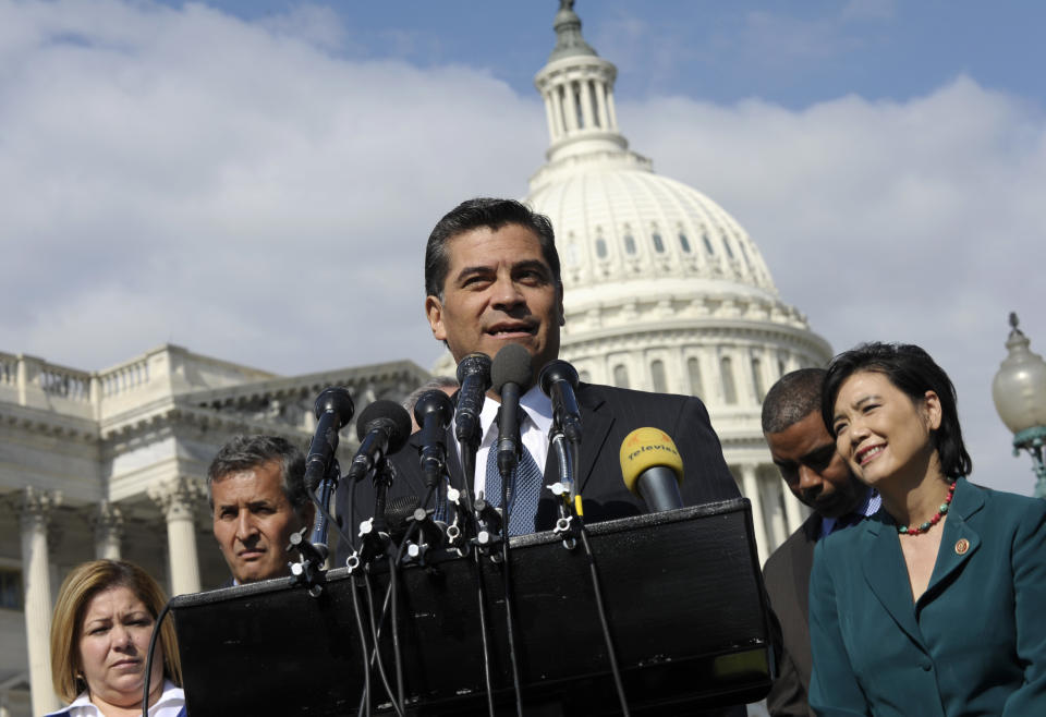 FILE - In this Oct. 23, 2013 file photo Rep. Xavier Becerra, D-Calif., center, speaks about immigration reform during a news conference on Capitol Hill in Washington. As the most populous state’s first Latino attorney general, Becerra is uniquely positioned to oppose the Trump administration’s immigration crackdown. He may turn up the heat even more, buoyed by his overwhelming endorsement from voters, a Democratic U.S. House and a new, more aggressive governor who takes office Jan. 7, 2019. (AP Photo/Susan Walsh, File)