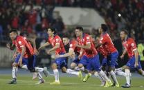 Chile players celebrate after defeating Argentina in their Copa America 2015 final soccer match at the National Stadium in Santiago, Chile, July 4, 2015. REUTERS/Jorge Adorno -