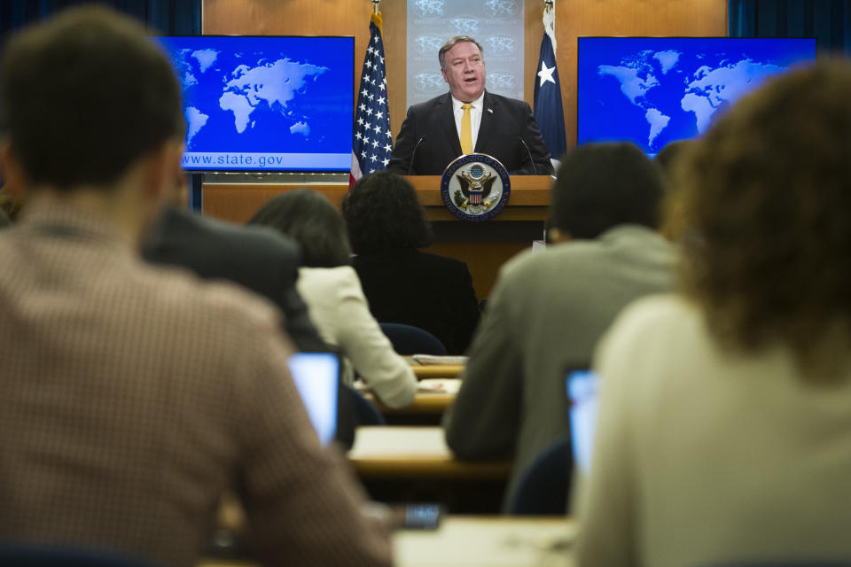 Secretary of State Mike Pompeo briefs reporters at the State Department in Washington, Wednesday, Oct. 3, 2018. Pompeo has announced that the U.S. is canceling a 1955 treaty with Iran establishing economic relations and consular rights between the two nations. (AP Photo/Cliff Owen)