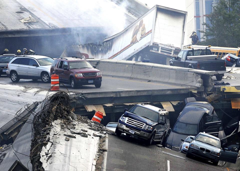 FILE - In this Wednesday, Aug. 1, 2007 picture, vehicles are scattered along the broken remains of the Interstate 35W bridge, which stretches between Minneapolis and St. Paul, after it collapsed into the Mississippi River during evening rush hour. The collapse of the Francis Scott Key Bridge in Baltimore following a ship strike on March 26, 2024 brought back jarring memories of their own ordeals to people who survived previous bridge collapses. (Stacy Bengs/The Minnesota Daily via AP)