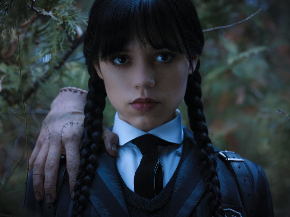 Jenna Ortega and Thing in Netflix's "Wednesday."